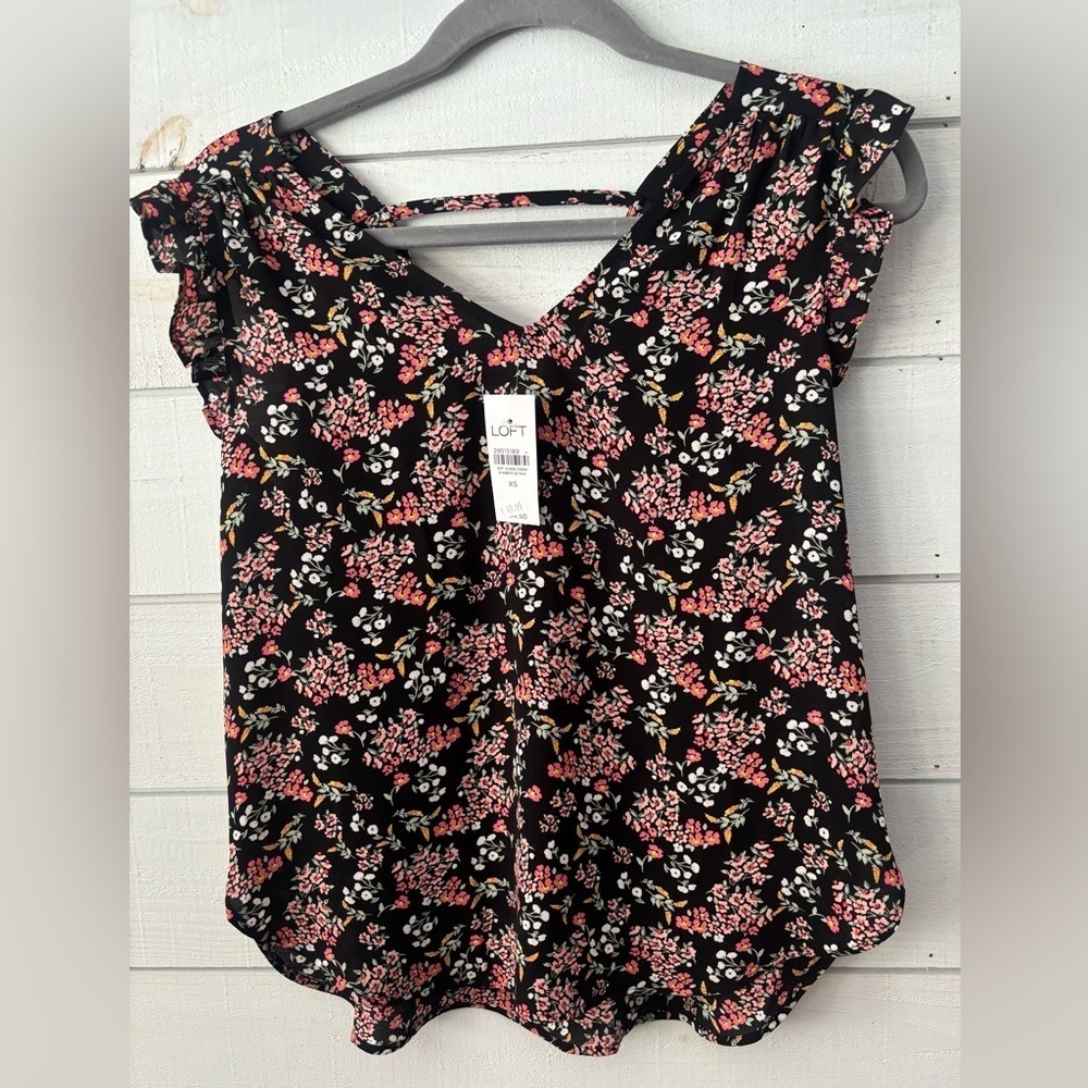 LOFT NWT Floral Black Top with Flutter sleeves .